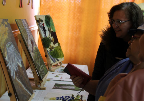 Afiche del evento "Expo "Talleres vecinales: Descubriendo las atmósferas y texturas del paisaje Austral, desde el arte pictórico y textil""