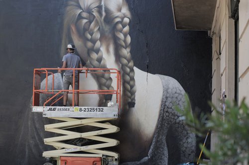 Afiche de "Ganza y China: murales emblemáticos en Santiago"